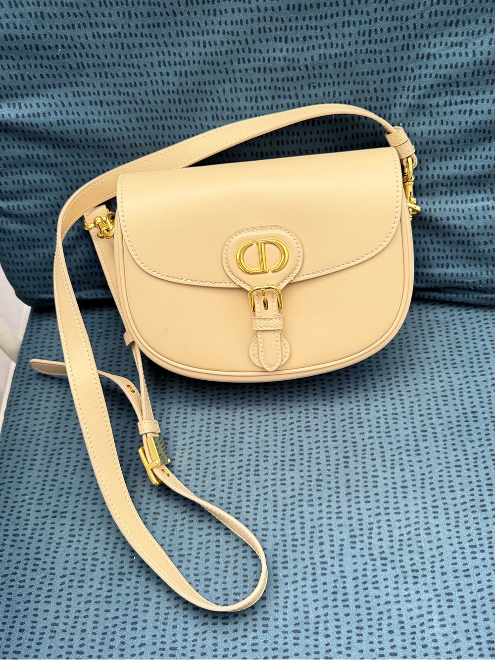 Cream Leather Saddle Crossbody Bag with Gold Hardware